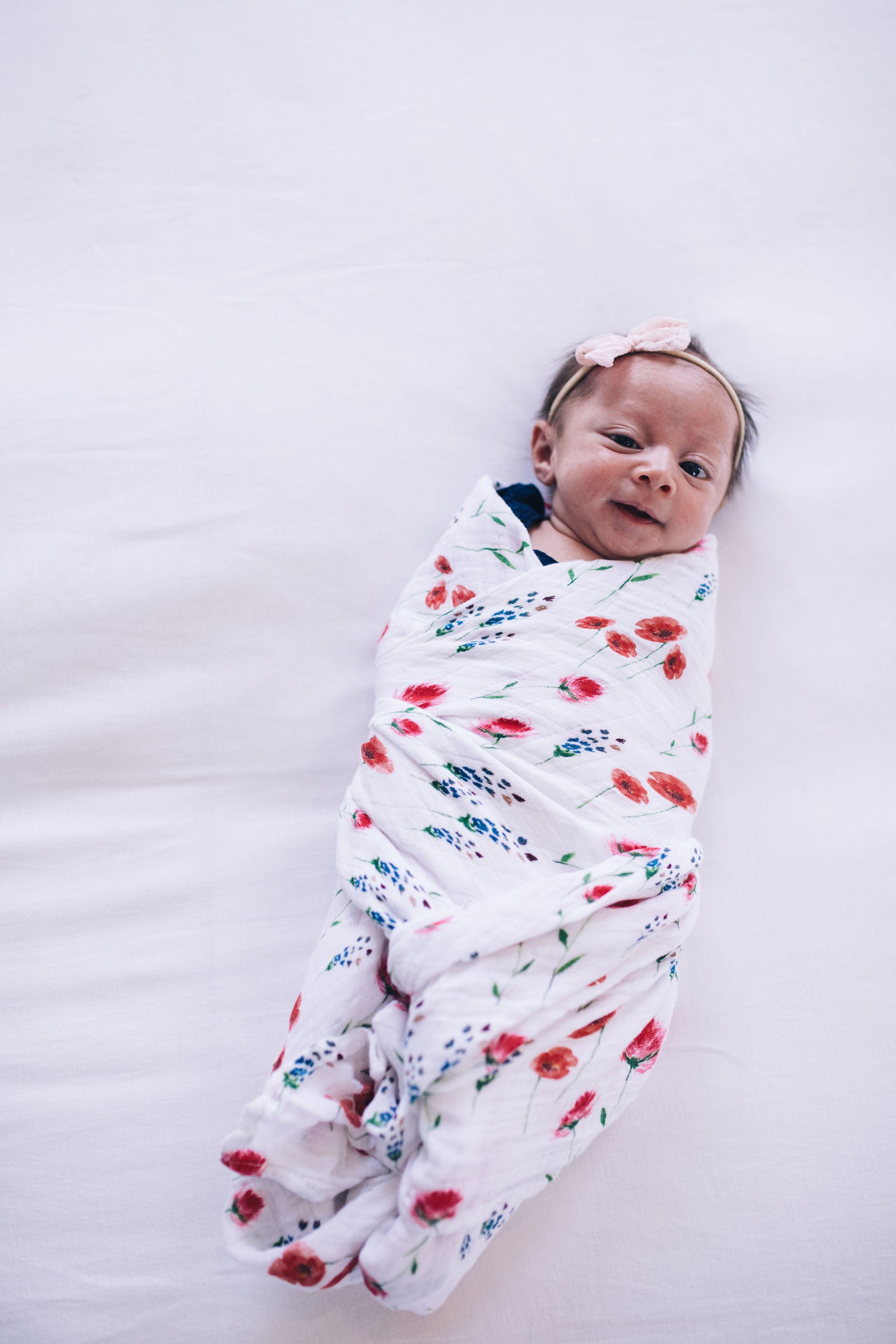 little unicorn cotton muslin swaddle in wild mums