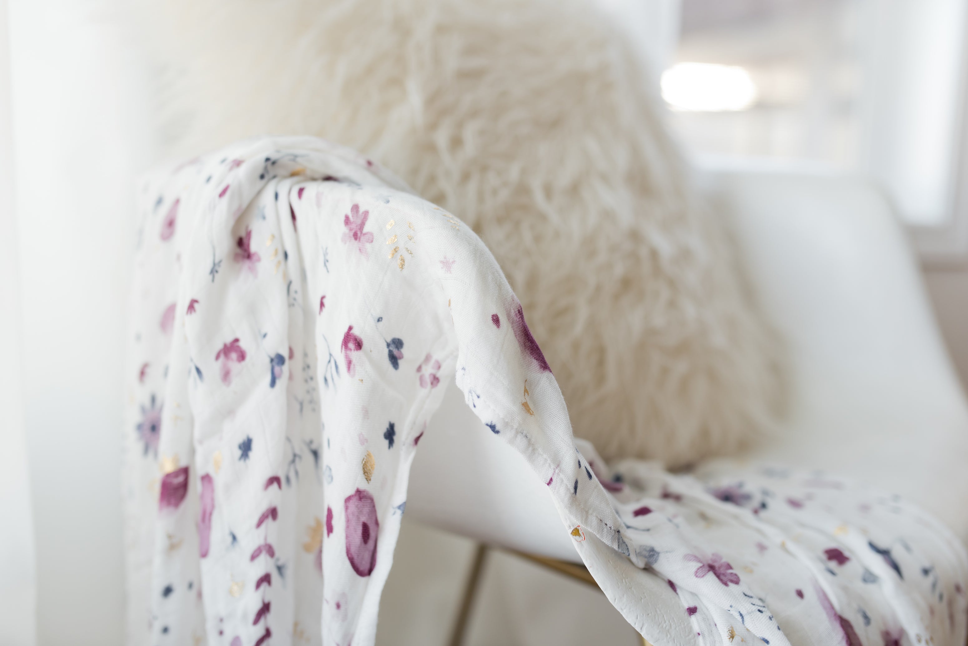 little unicorn deluxe muslin swaddle in fairy garden