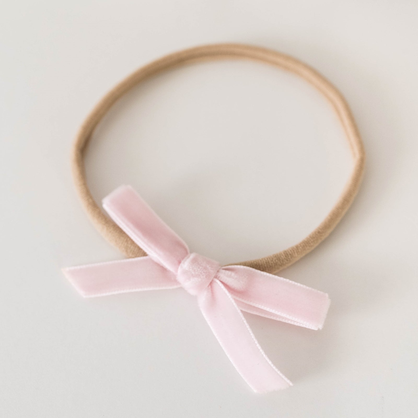 Snuggle Hunny Kids Petite Velvet Bow in lullaby pink
