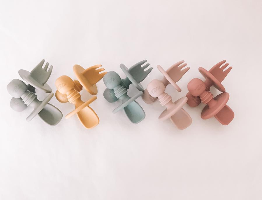 petite eats silicone cutlery set in sand