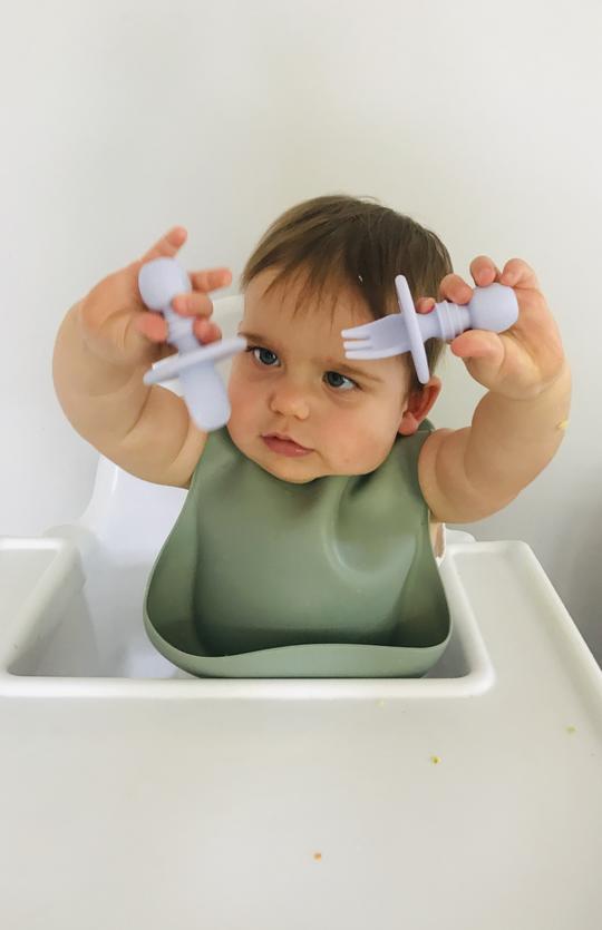petite eats silicone cutlery set in sand