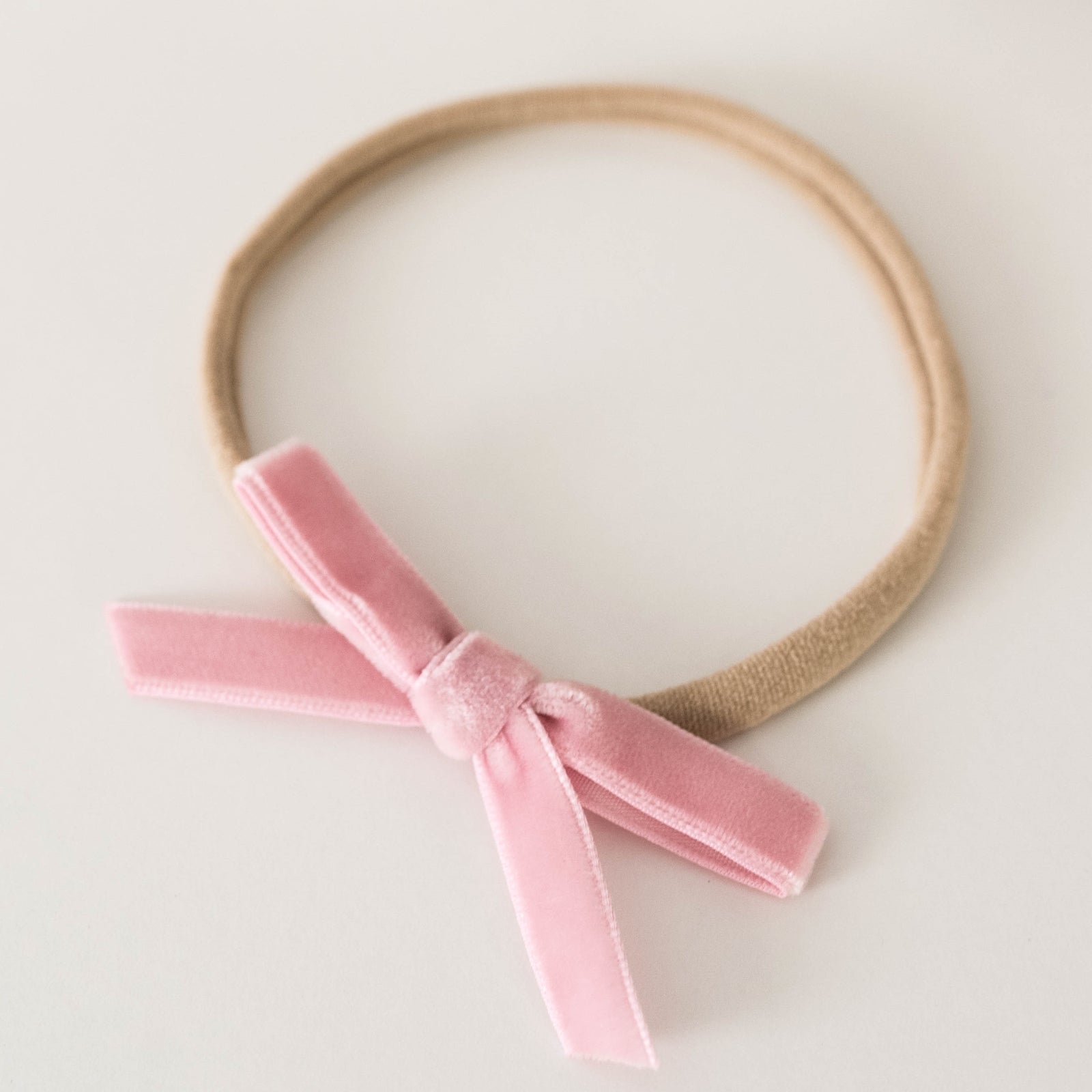 Snuggle Hunny Kids Petite Velvet Bow in lrose pink