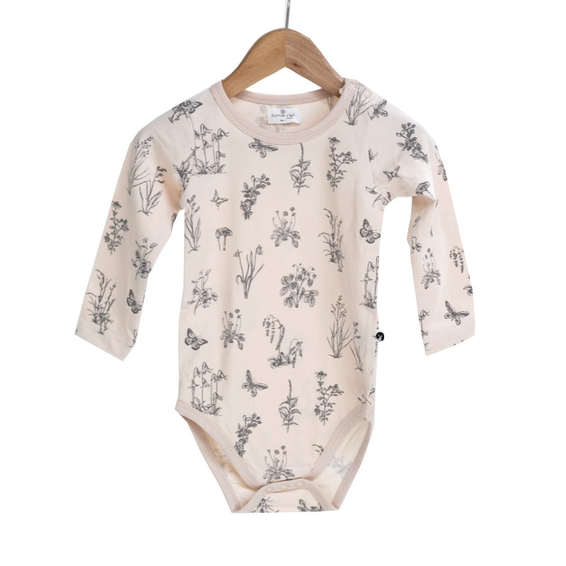 burrow & be long sleeve bodysuit in blush meadow