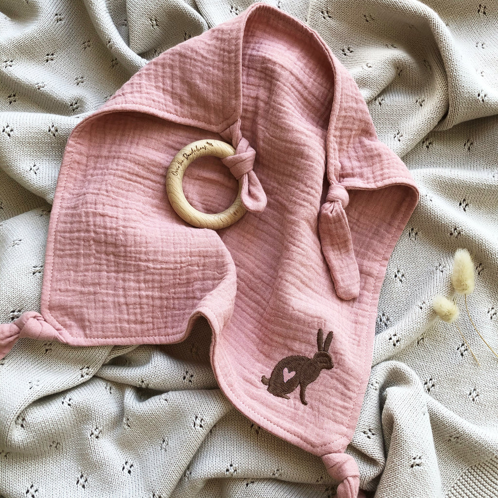 over the dandelions embroidered lovey and teether in shell pink