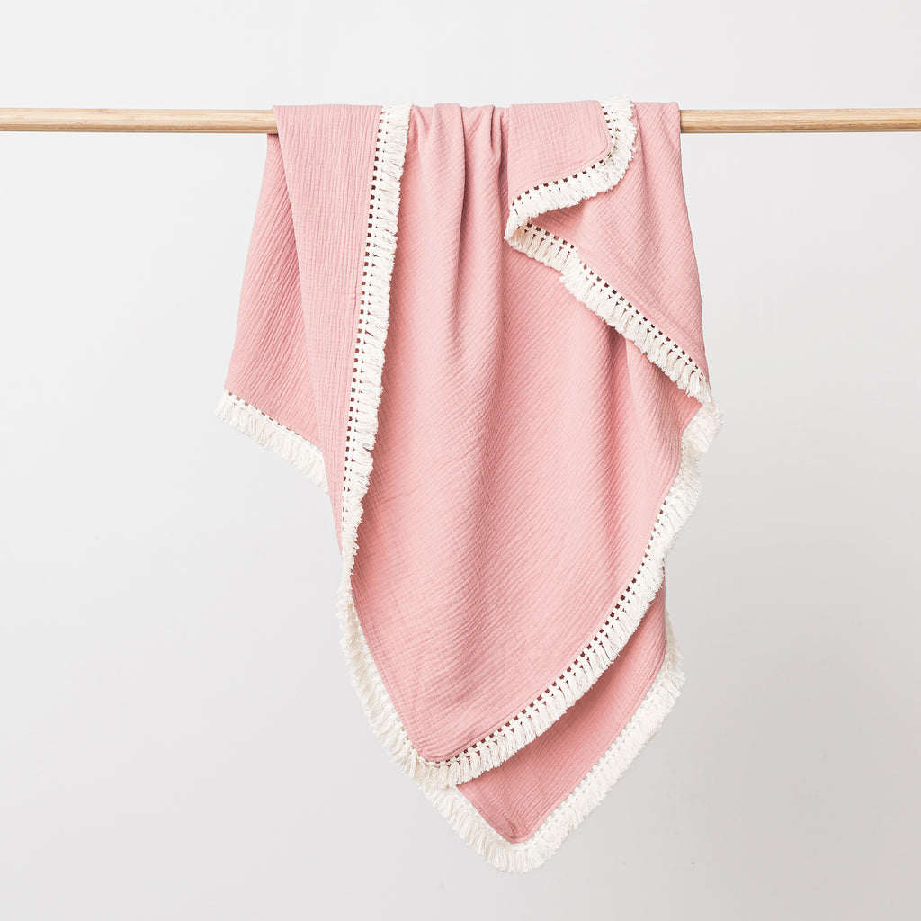 over the dandelions muslin blanket with tassels in shell pink