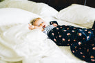 little unicorn cotton muslin swaddle in midnight rose