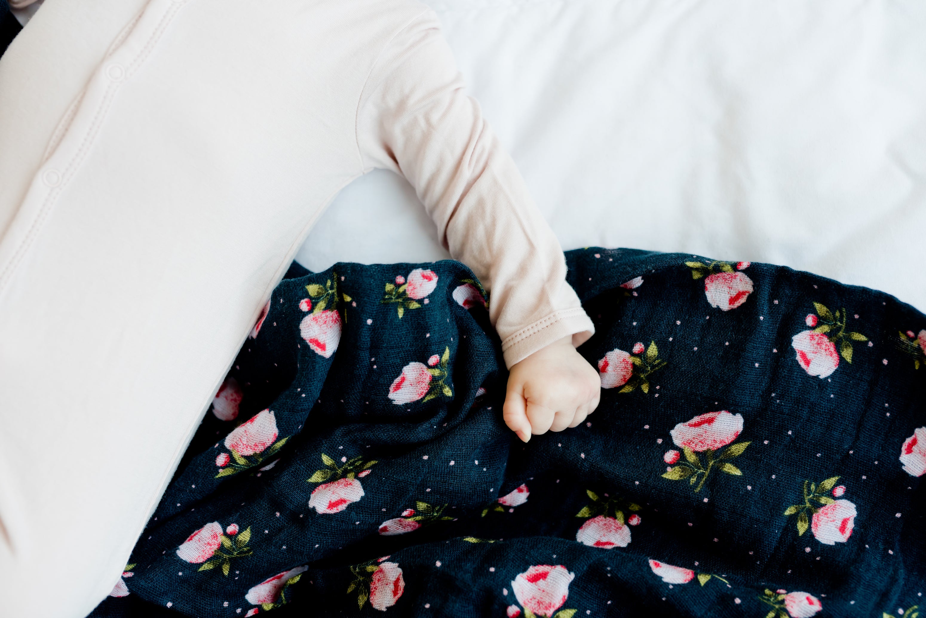 little unicorn cotton muslin swaddle in midnight rose