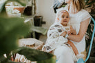 little unicorn deluxe muslin swaddle in hedgehog