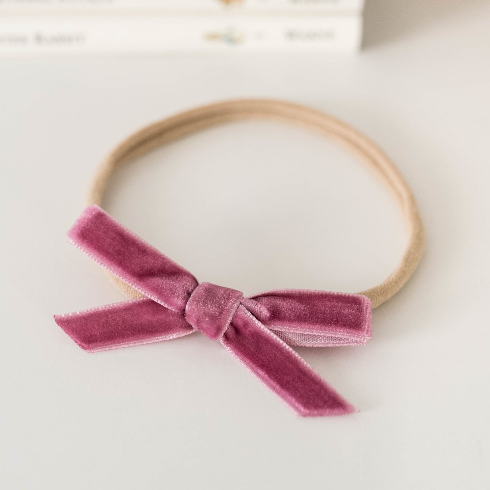 snuggle hunny kids petite velvet bow in mauve