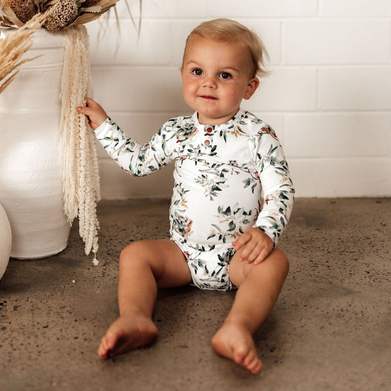 snugglehunny kids longsleeve baby bodysuit in eucalypt print
