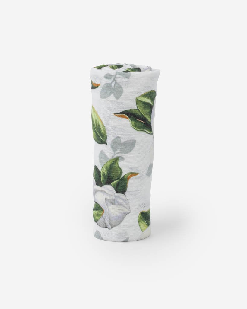 little unicorn cotton muslin swaddle in magnolia blooms