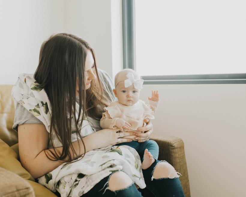 little unicorn cotton muslin swaddle in magnolia blooms