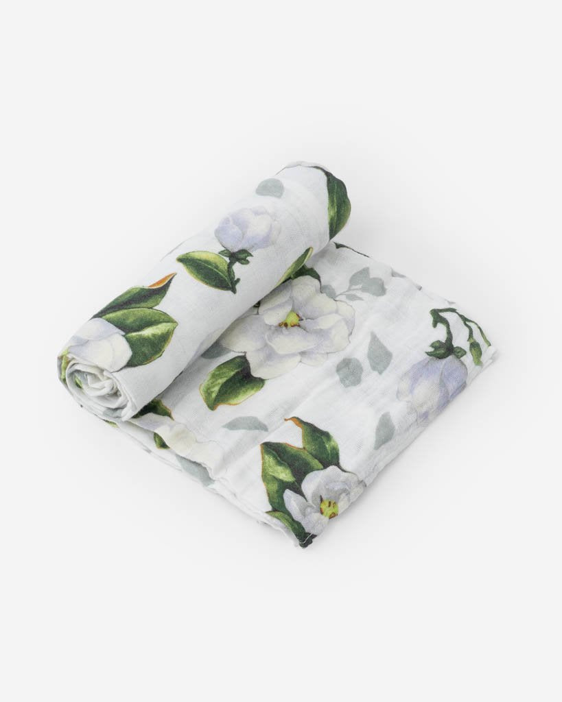 little unicorn cotton muslin swaddle in magnolia blooms