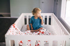 little unicorn cotton muslin swaddle in summer poppy