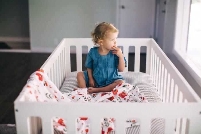 little unicorn cotton muslin swaddle in summer poppy