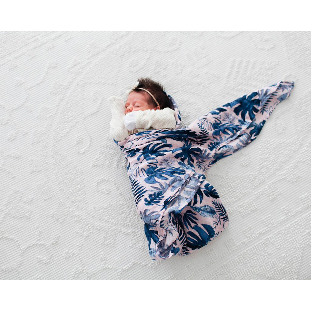 little unicorn cotton muslin swaddle in tropical pink