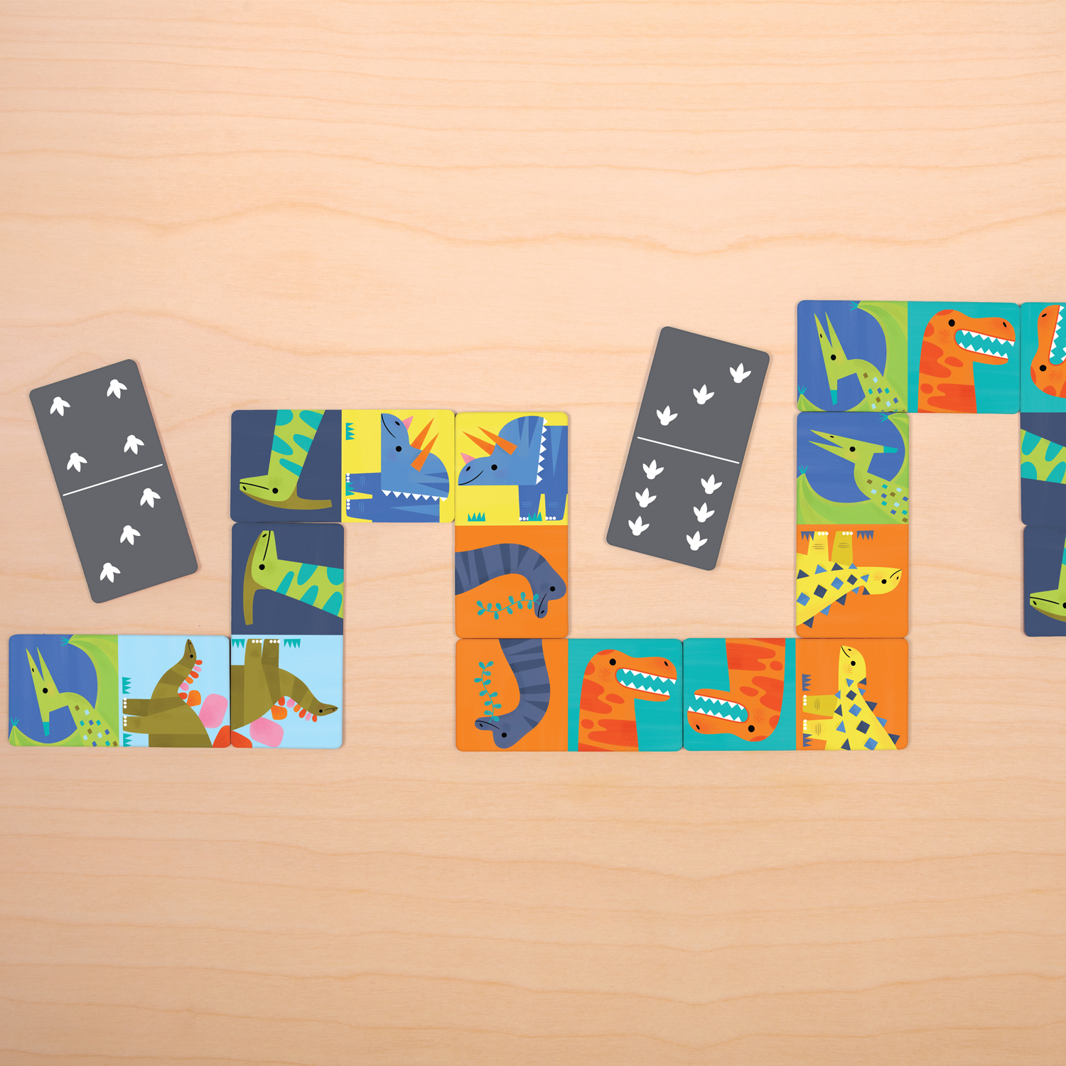 mudpuppy dominoes set in dinosaurs