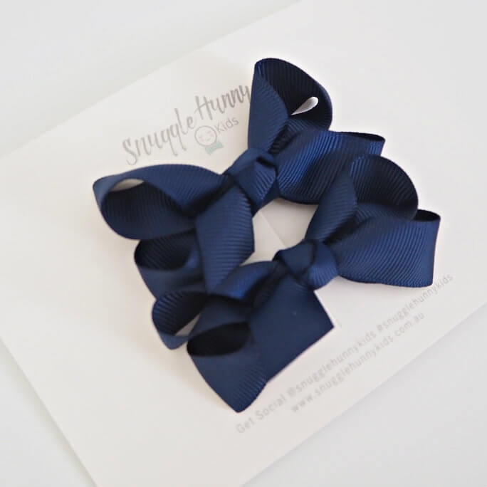 snuggle hunny kids hair clip bow in small piggy in navy