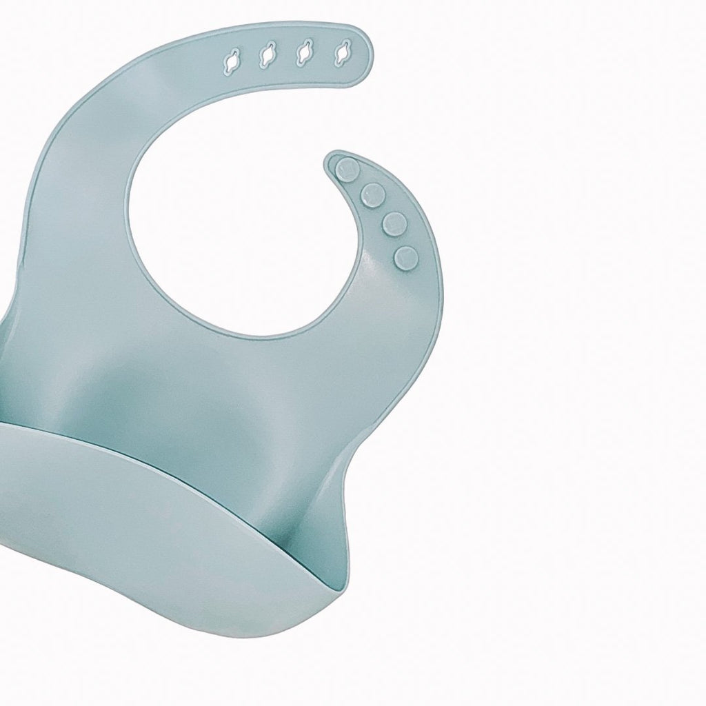 petite eats silicone bib in teal